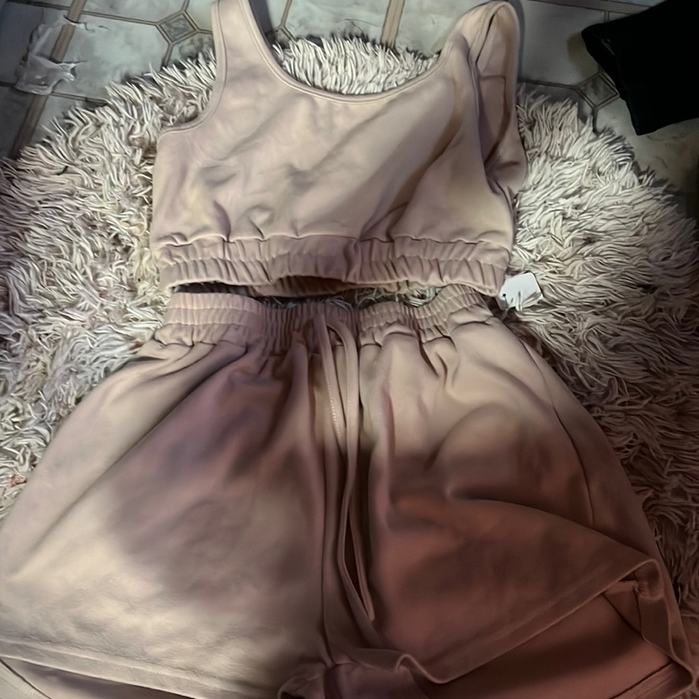 two piece skin tone outfit crop top and basketball shorts